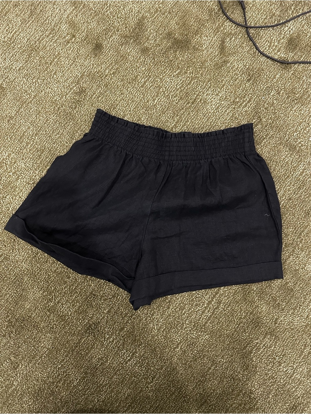 Reformation Black High-Waist Smocked Linen-Blend Shorts